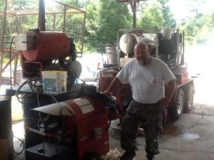 Whitco pressure washer in industrial setting